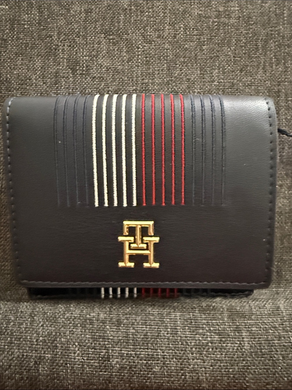 Tommy Hilfiger Black Leather Wallet with Red, White, and Navy Stitching